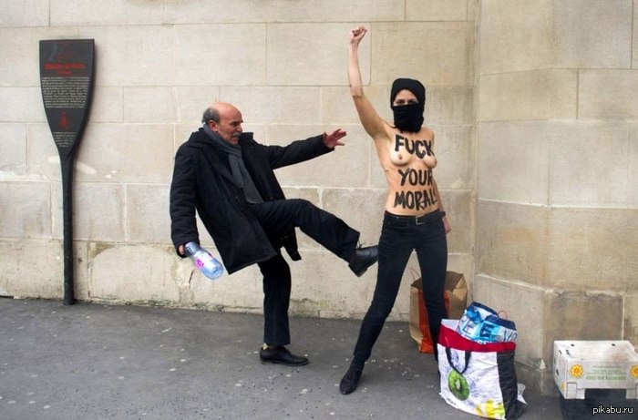 An elderly man at the Paris Cathedral Mosque kicks an activist from the Ukrainian feminist group Femen, - NSFW, Femen, Activists