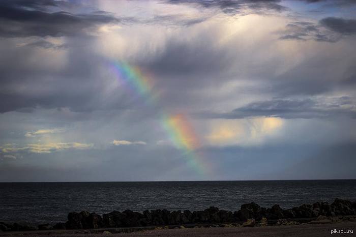 Above the gray plain of the sea, the wind gathers clouds ... - Sea, The clouds, Rainbow