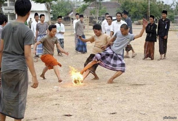 Football burning coconut in Indonesia - Football, Indonesia