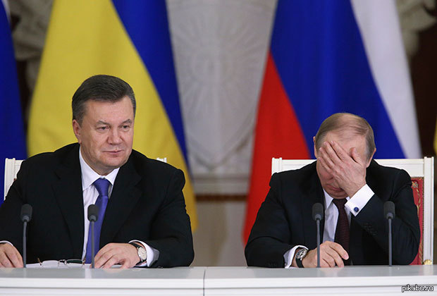 Все понятно без слов.Виктор Янукович и Владимир Путин во время подписания соглашений 17 декабря 2013 года