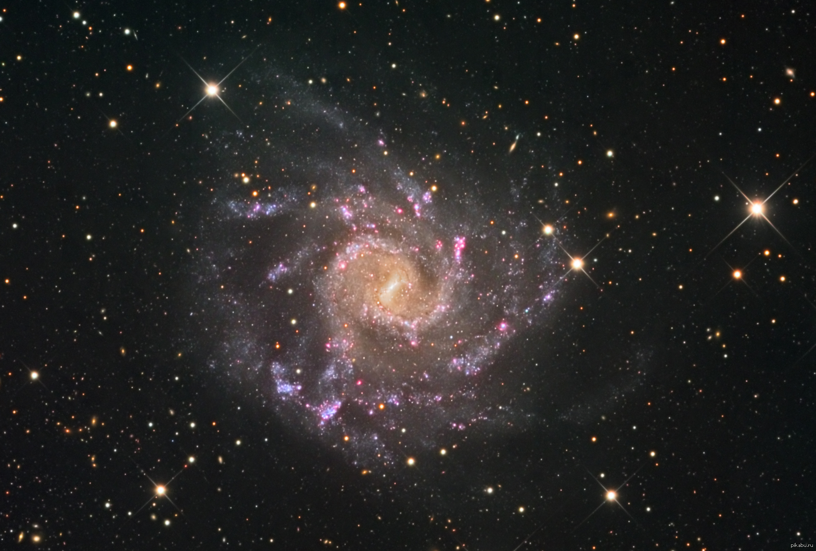 Фото галактики описание. Спиральная Галактика NGC 2997. Спиральная Галактика NGC 4414. NGC 6207. Галактика это в астрономии.