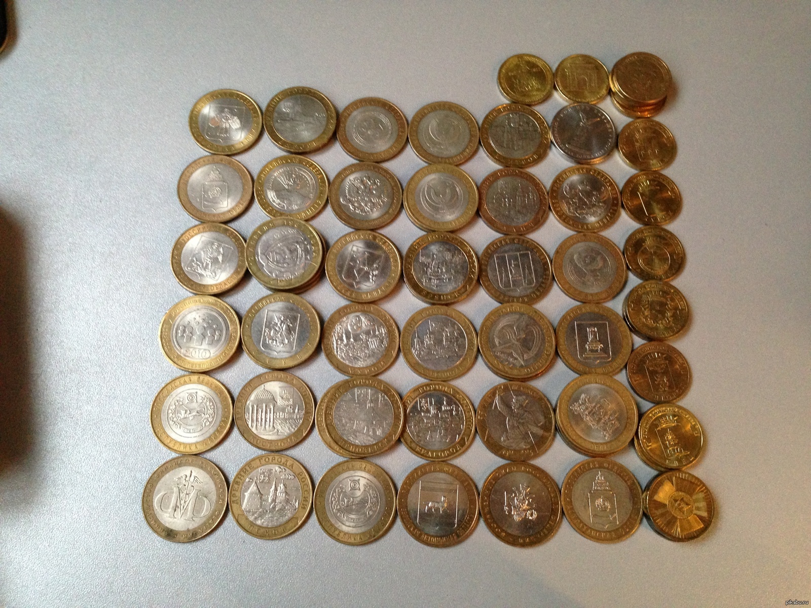 Коллекция нумизмата. Коллекция монет. Коллекционер монет. Нумизматы коллекционеры монет. Коллекционировать монеты.
