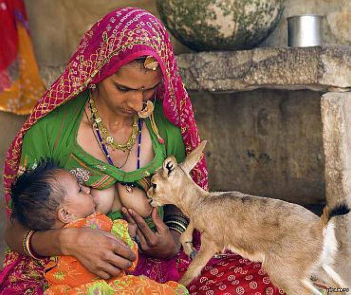 Girl Breastfeeding Puppy